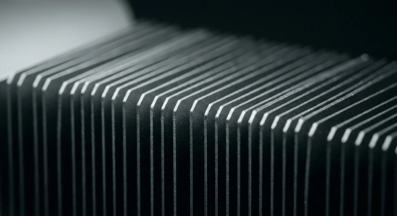 A machined heatsink fin stack, close.